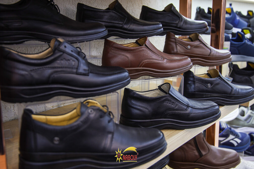NABOLY leather dress shoes displayed in the showroom