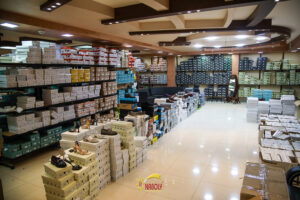 The NABOLY stockroom in Hebron, boxed footwear ready for wholesale orders